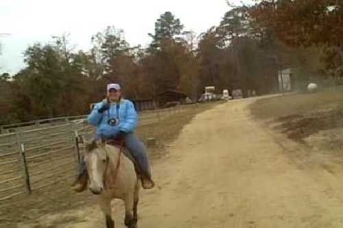 37 Kelley heading out for trail ride.jpg