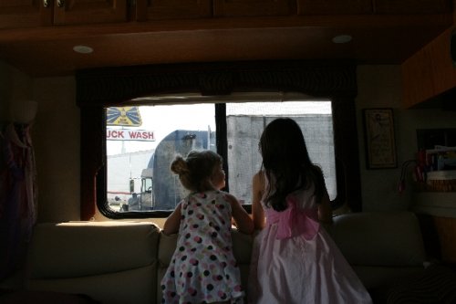 01 Katrina and Sam watching the trucks.JPG